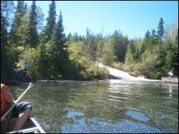 A glimpse of Crowduck Falls from the portage