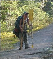 Peter - 11 years old - with his load across the Crowduck Portage